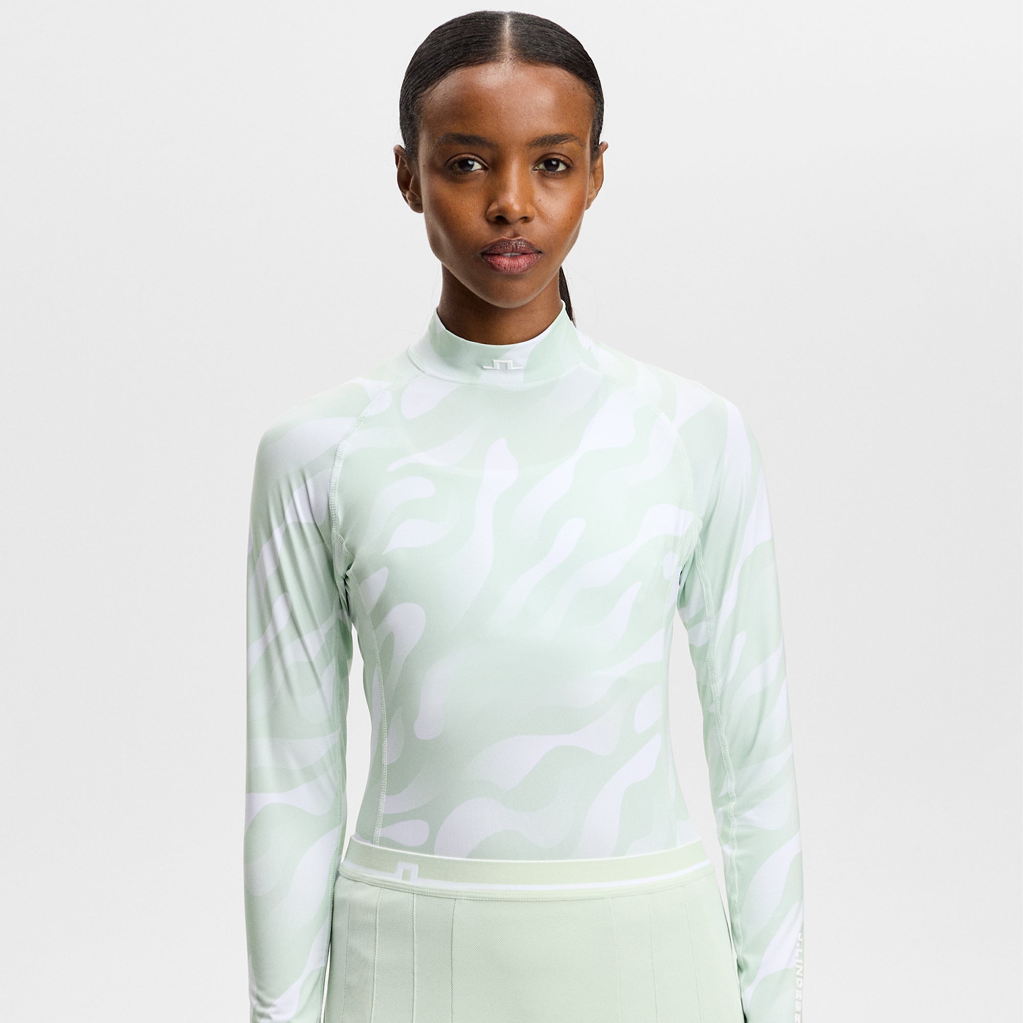 J Lindeberg Ella Print Ladies Compression Golf Top Bunker Fade Subtle Green White