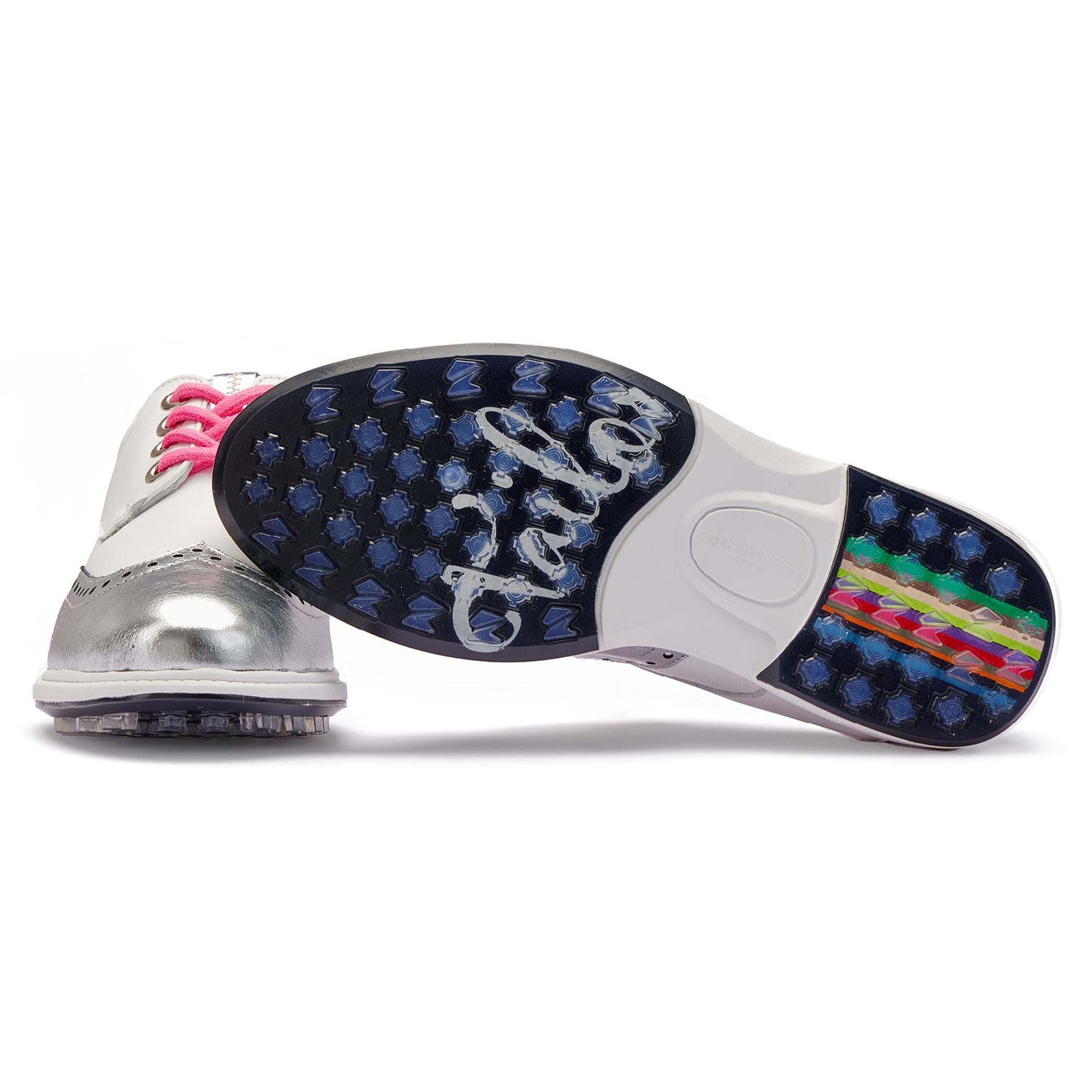 Bottom view of Royal Albartross Tailor Wingtip Brogue ladies golf shoes in white and silver – spikeless sole for comfort and traction on the course