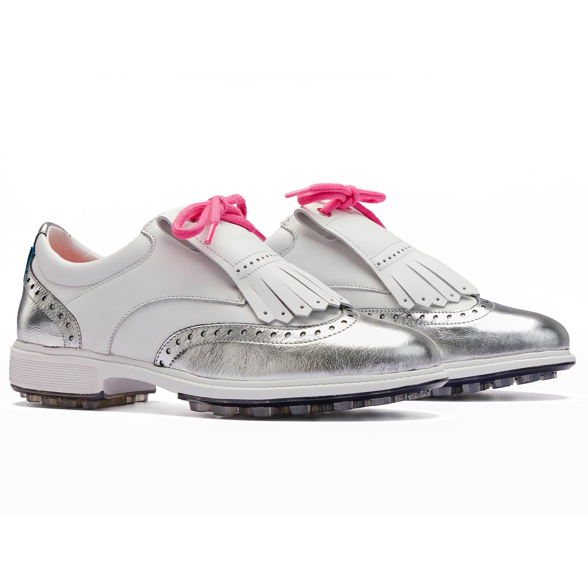 Side view of both Royal Albartross Tailor Wingtip Brogue ladies golf shoes in white and silver with kiltie – handcrafted luxury golf shoes for women