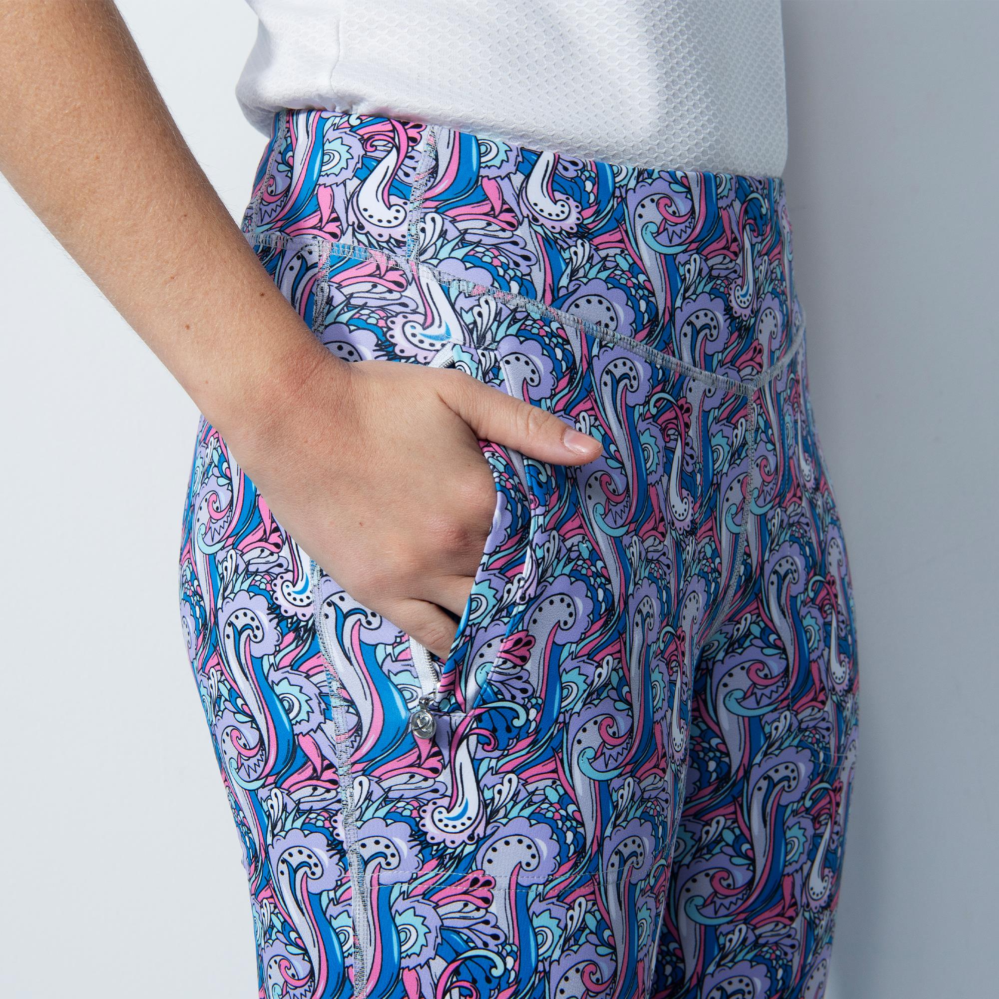 Close up of pocket detail on ladies flared patterned pants