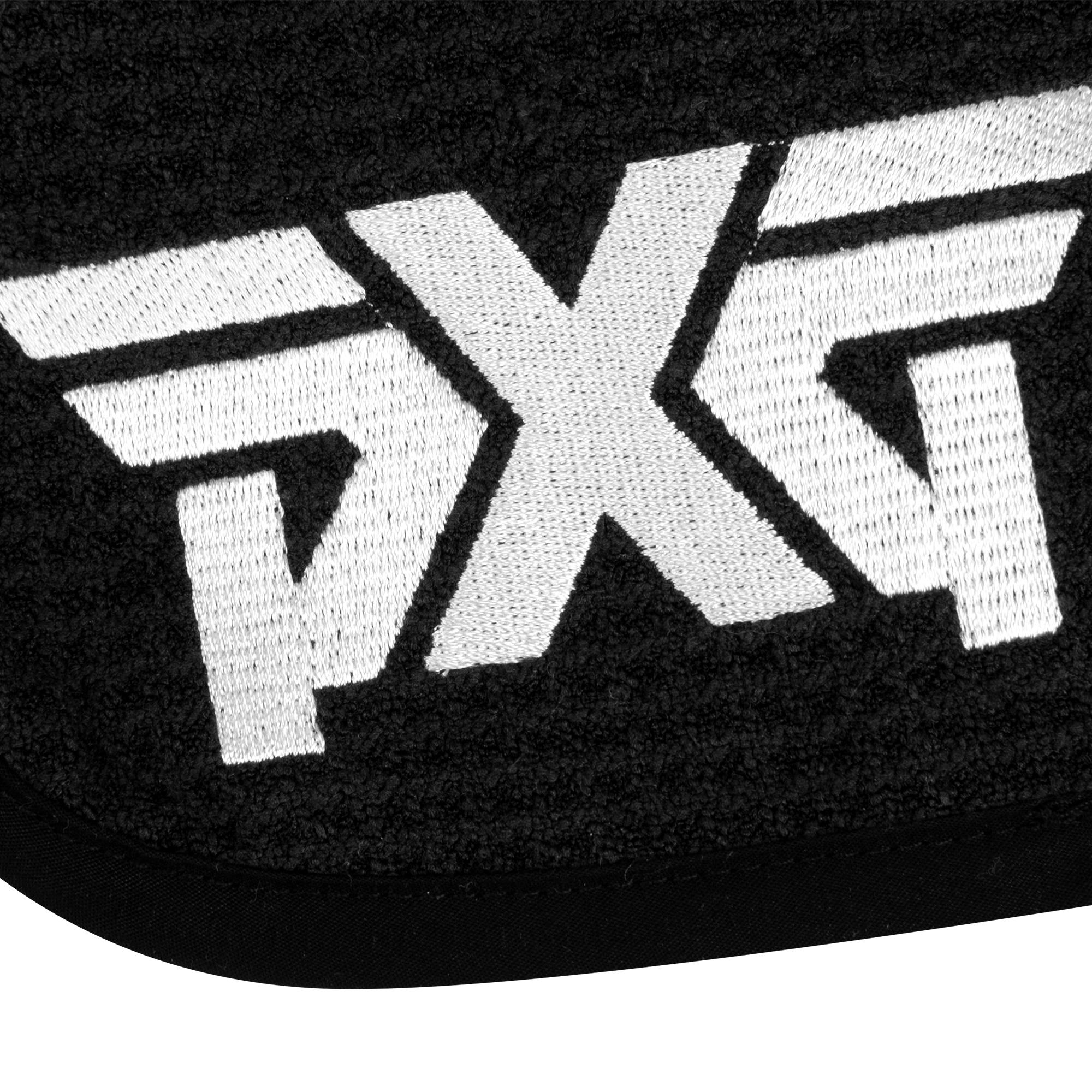 Detailed close-up of PXG logo embroidery on towel