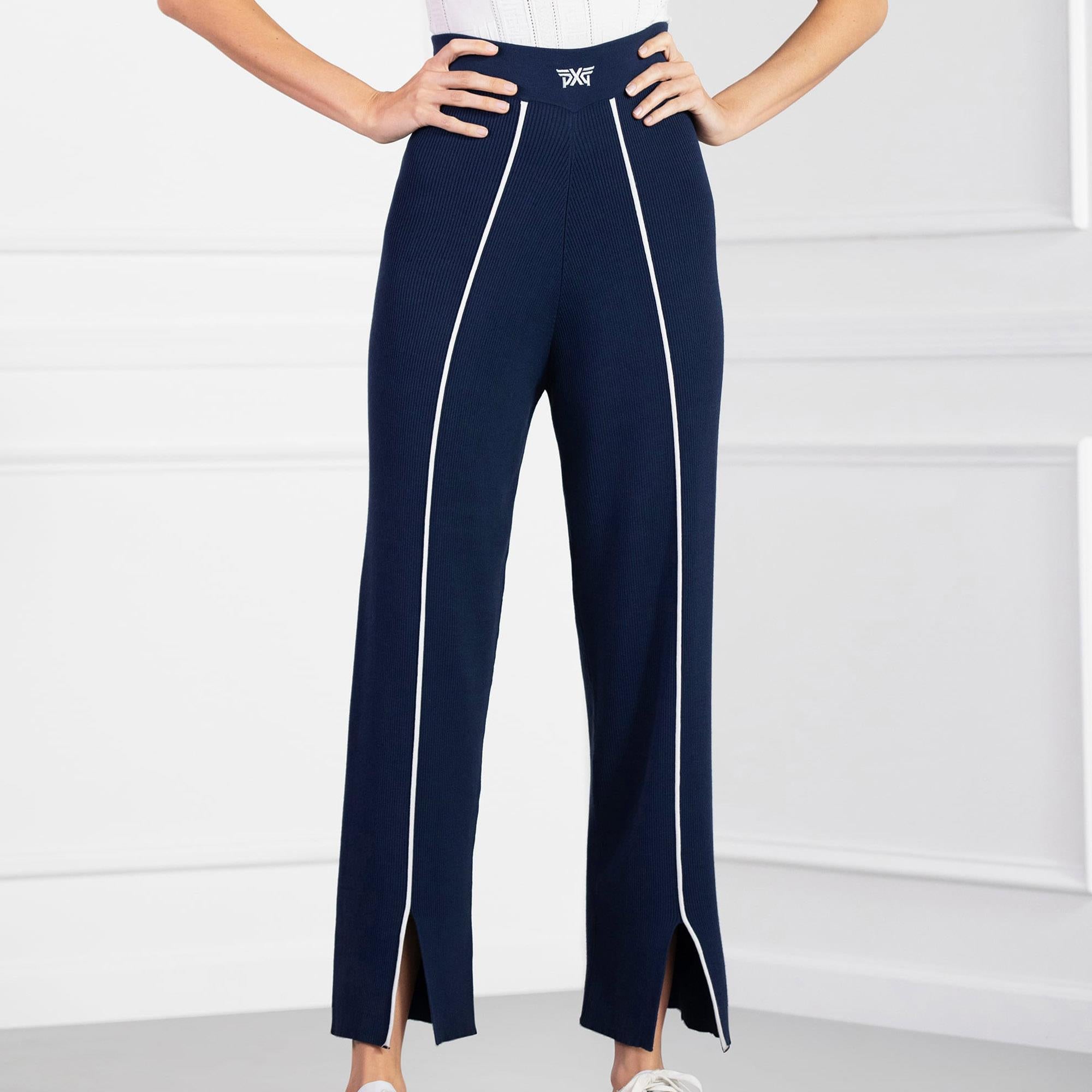 Model wearing PXG Contrast Seam Ladies Golf Pants in navy, front view