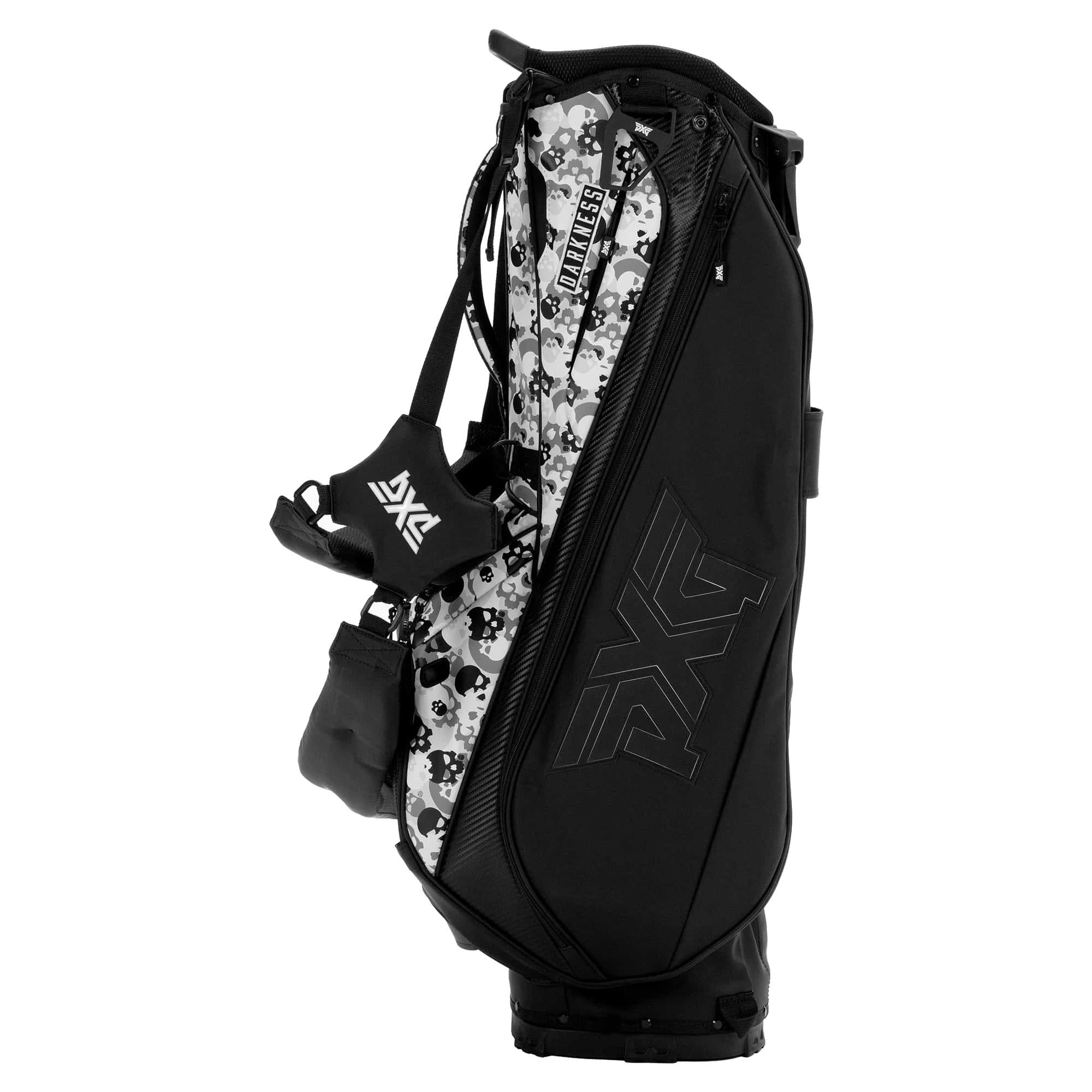 Side view showing multiple storage pockets on PXG Darkness Skull Camo Carry Stand Bag