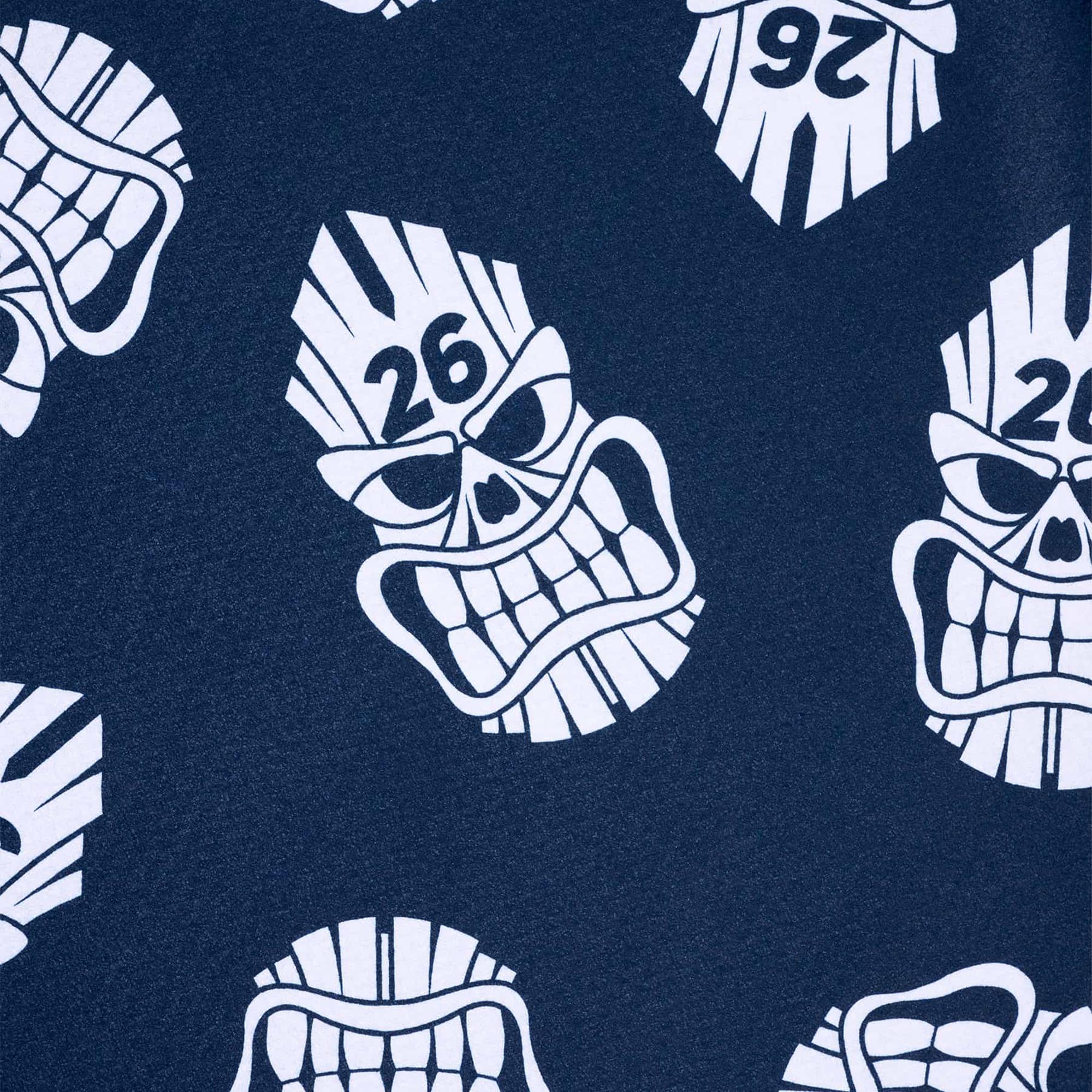 Close-up showing microfiber material texture of PXG Darkness Tiki Skull Players Towel