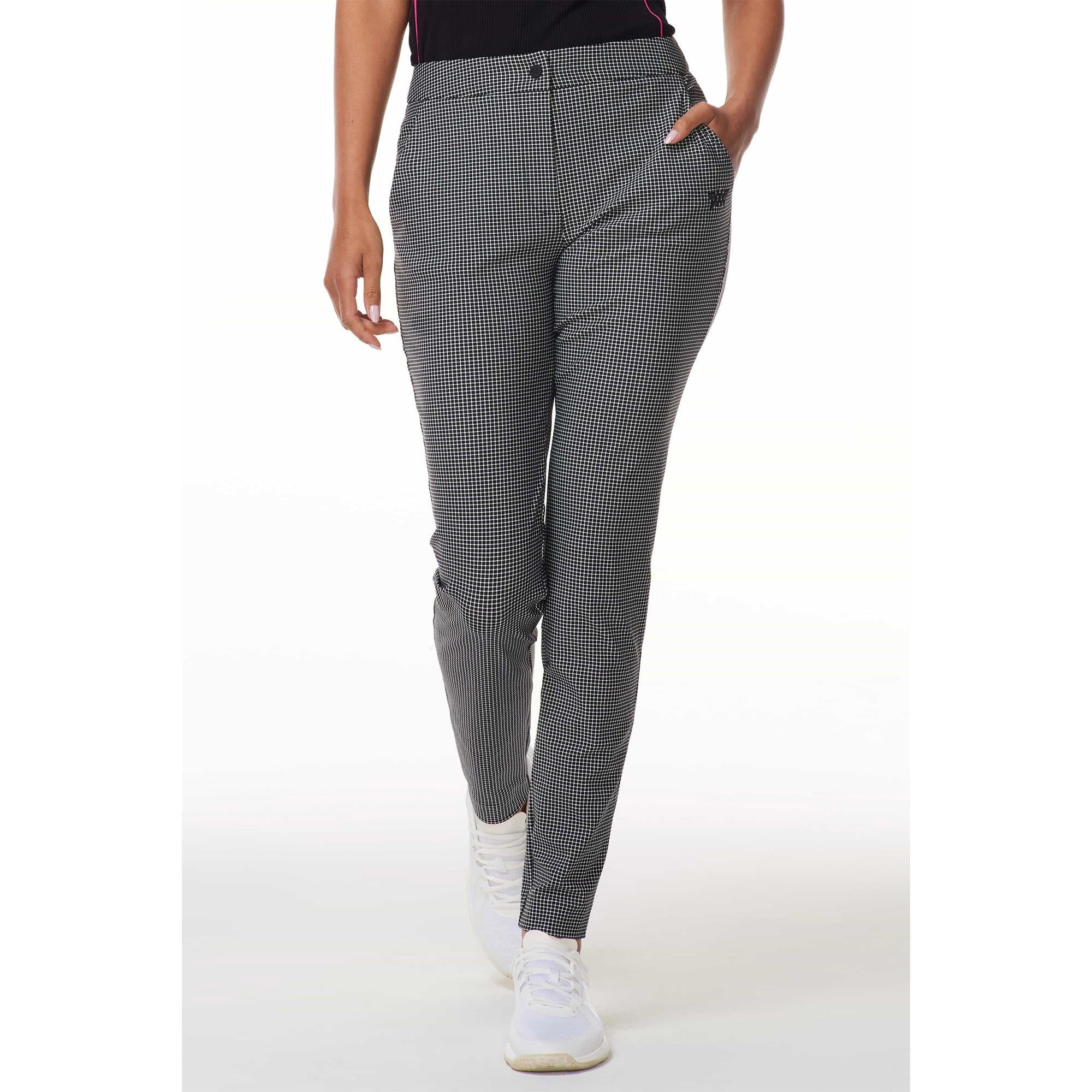 Female golfer modeling PXG Mini Check Ladies Golf Pants, front angle