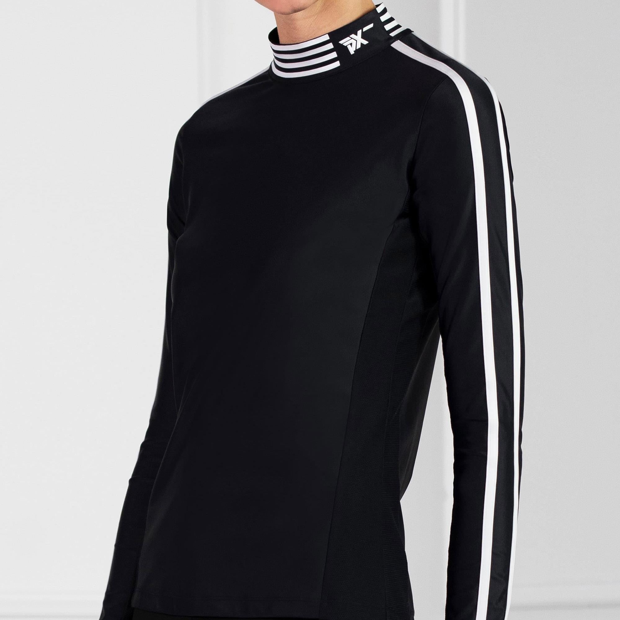 Side view of model wearing PXG Mock Neck Ladies Long Sleeve Golf Polo Shirt in black